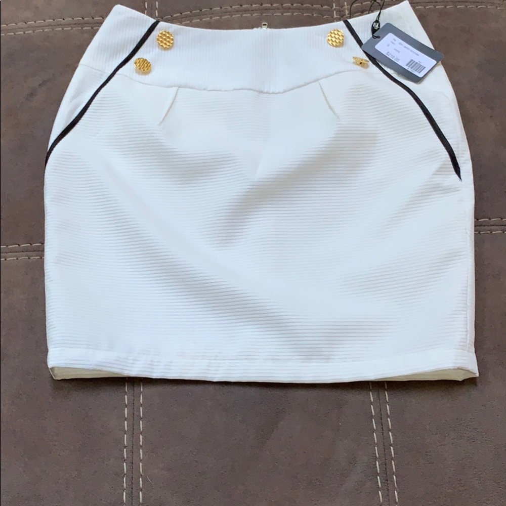 White Courage B skirt with gold buttons